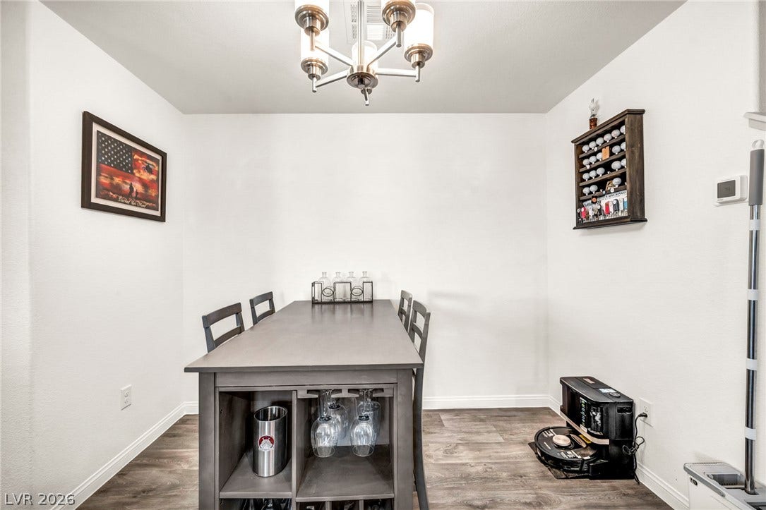 2594 Canary Yellow Court, North Las Vegas, NV 89086 Smooth wood floors anchor this clean dining space with built-in storage potential.