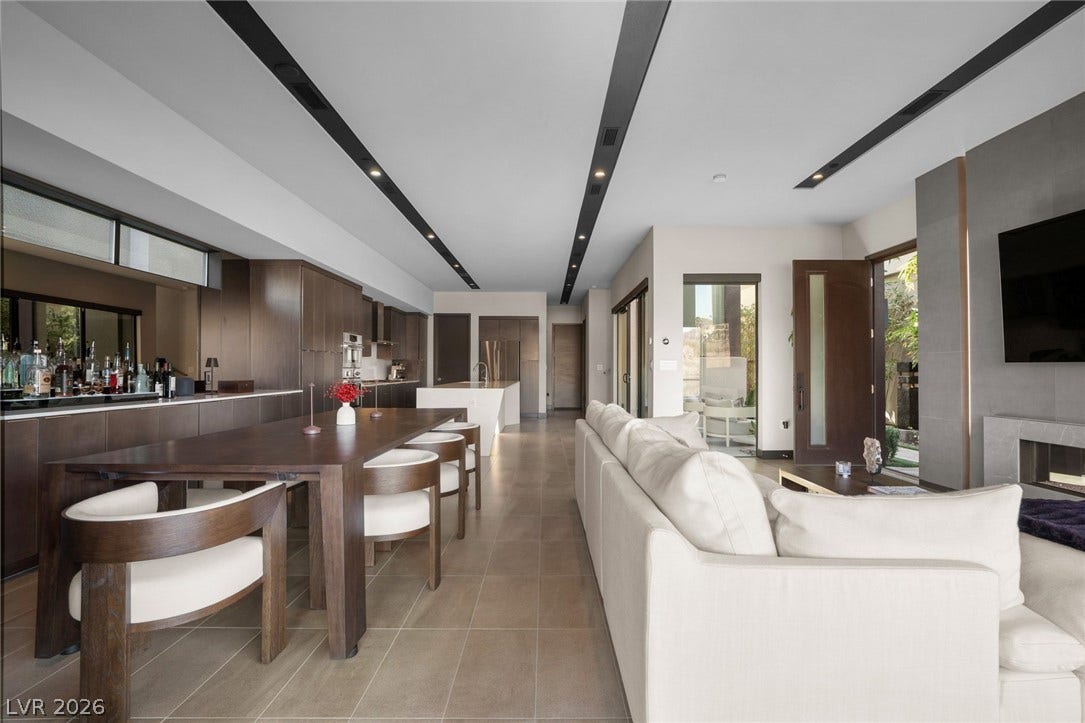 34 Lakefront Drive, Henderson, NV 89011 Gleaming tile floors run throughout this open concept space with high ceilings and clean architectural lines.