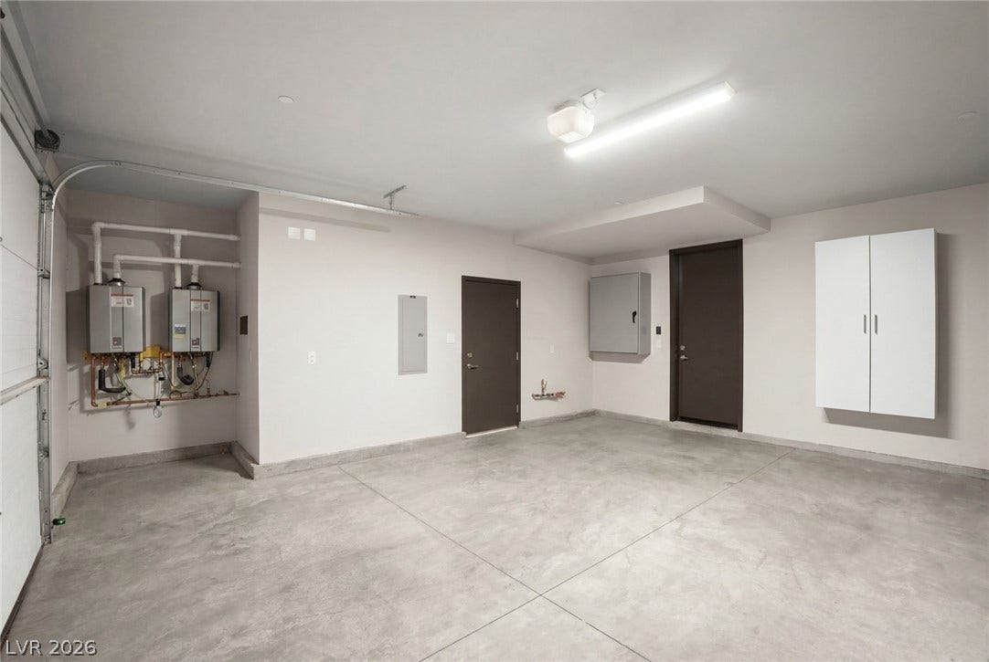 34 Lakefront Drive, Henderson, NV 89011 Smooth concrete floors and built-in storage define this highly functional garage space.