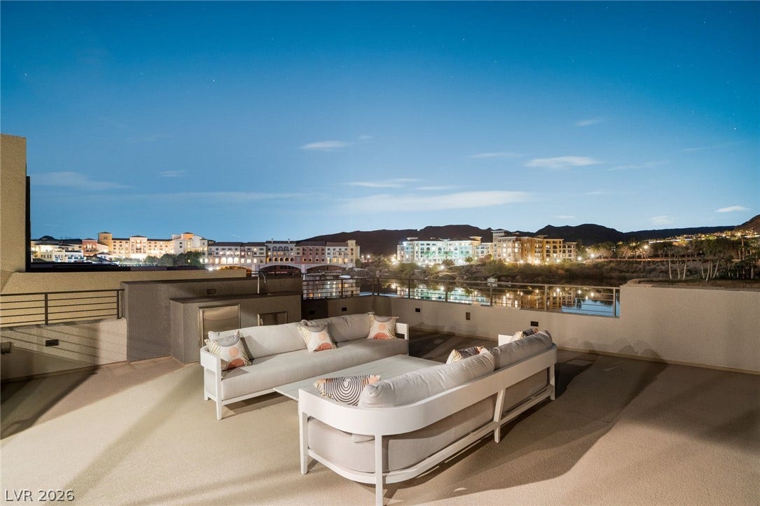 34 Lakefront Drive, Henderson, NV 89011 Panoramic mountain and water views provide a picturesque backdrop for this spacious rooftop terrace.