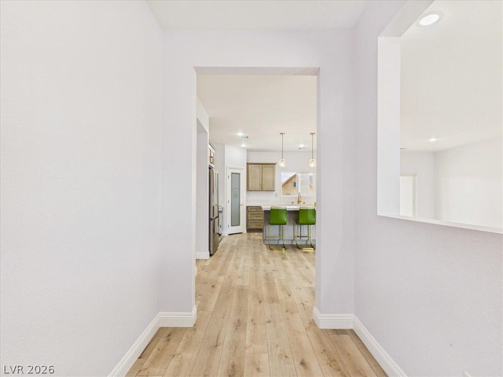 6680 S Raintree Court, Pahrump, NV 89061 A welcoming entryway transitions seamlessly into the light-filled main living areas.