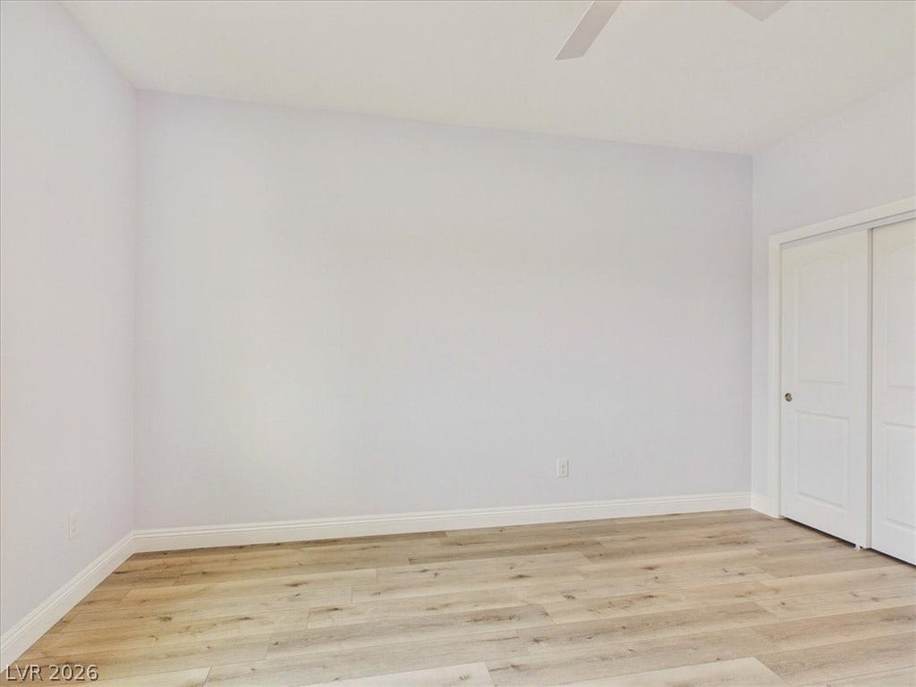 6680 S Raintree Court, Pahrump, NV 89061 Smooth wood floors and crisp white trim enhance this flexible, light-filled interior space.