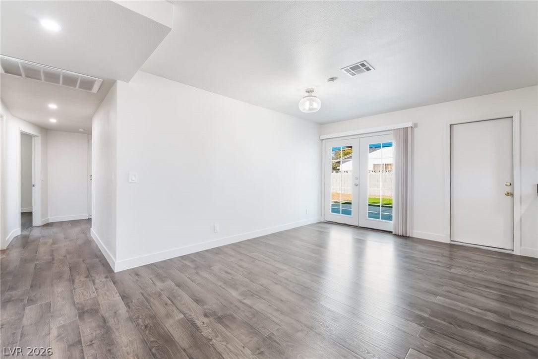 3623 E Biela Avenue, Las Vegas, NV 89120 Dining area with elegant, glass-paneled French doors.