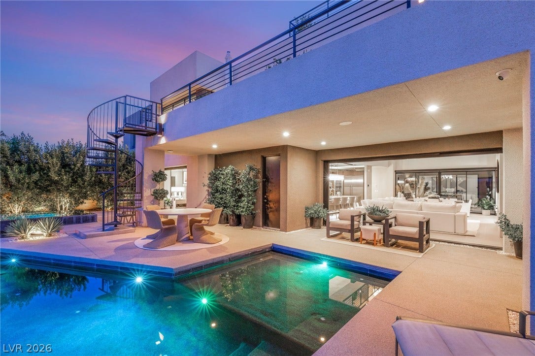 A private pool and terrace complement this contemporary home's luxurious outdoor living spaces.