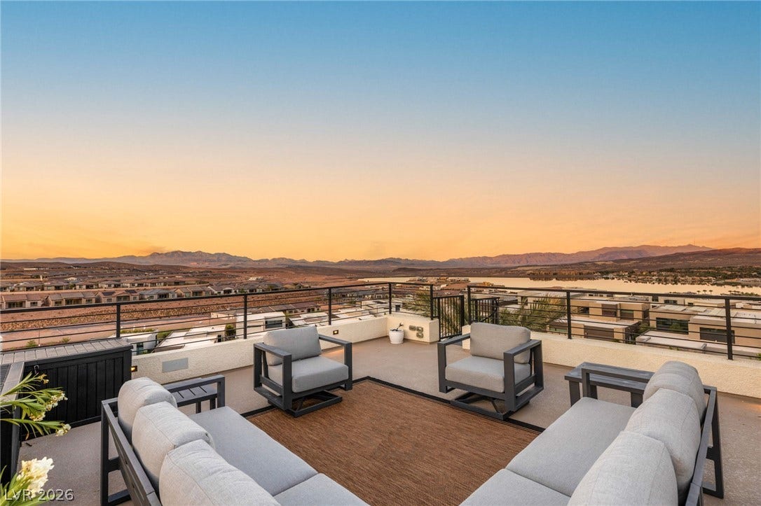 Witness magnificent lake and mountain panoramas from this spacious rooftop deck, perfect for sunset gatherings.