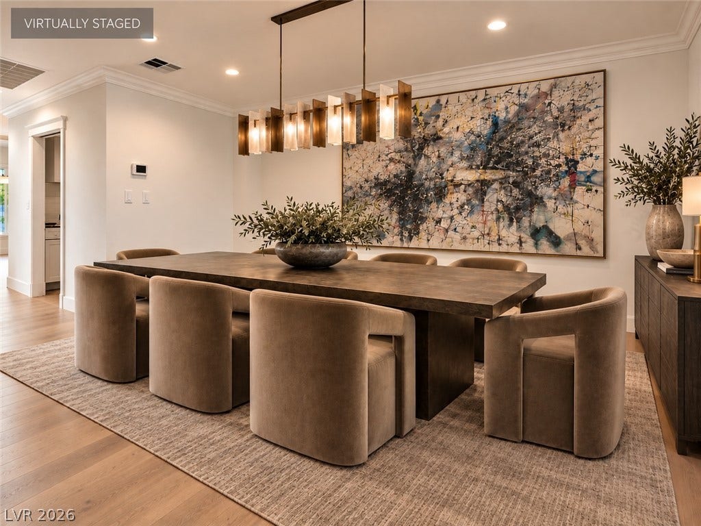 2001 Silver Avenue, Las Vegas, NV 89102 Gleaming hardwood floors and classic crown molding anchor this formal dining space.