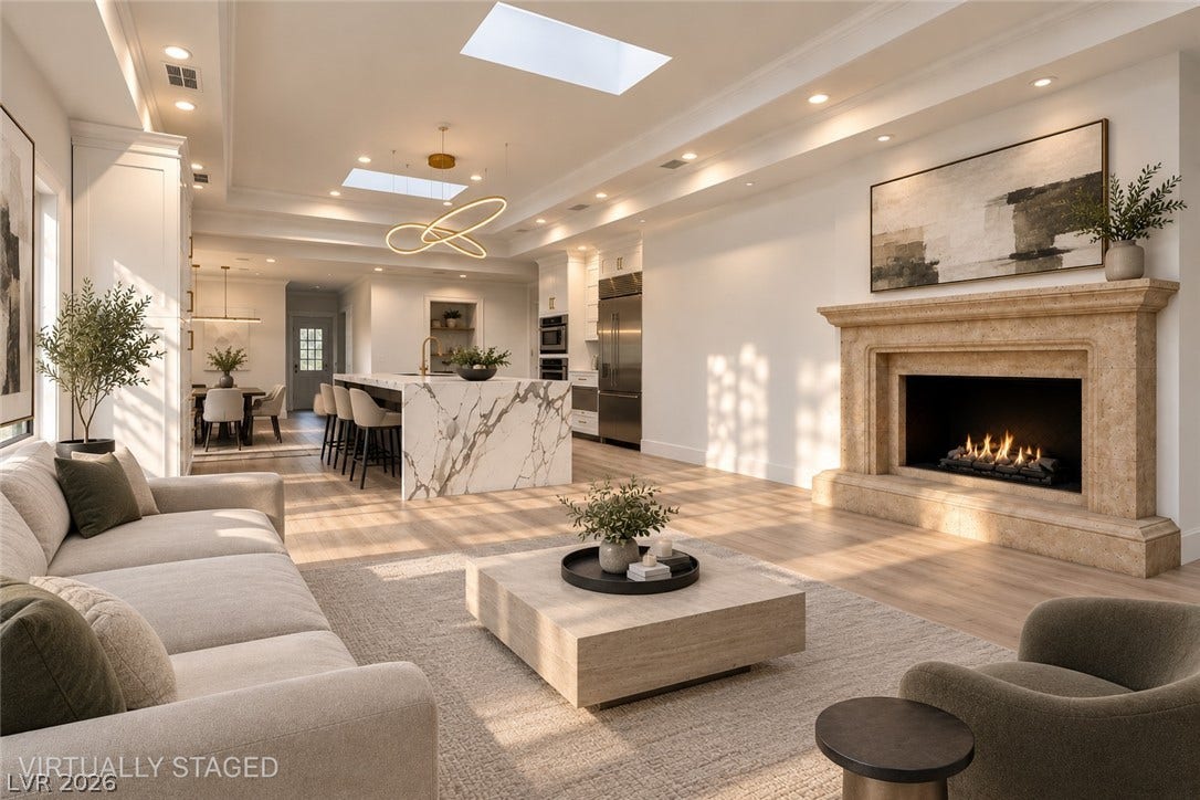 2001 Silver Avenue, Las Vegas, NV 89102 An elegant stone fireplace anchors this light-filled open living area with recessed lighting and skylights.
