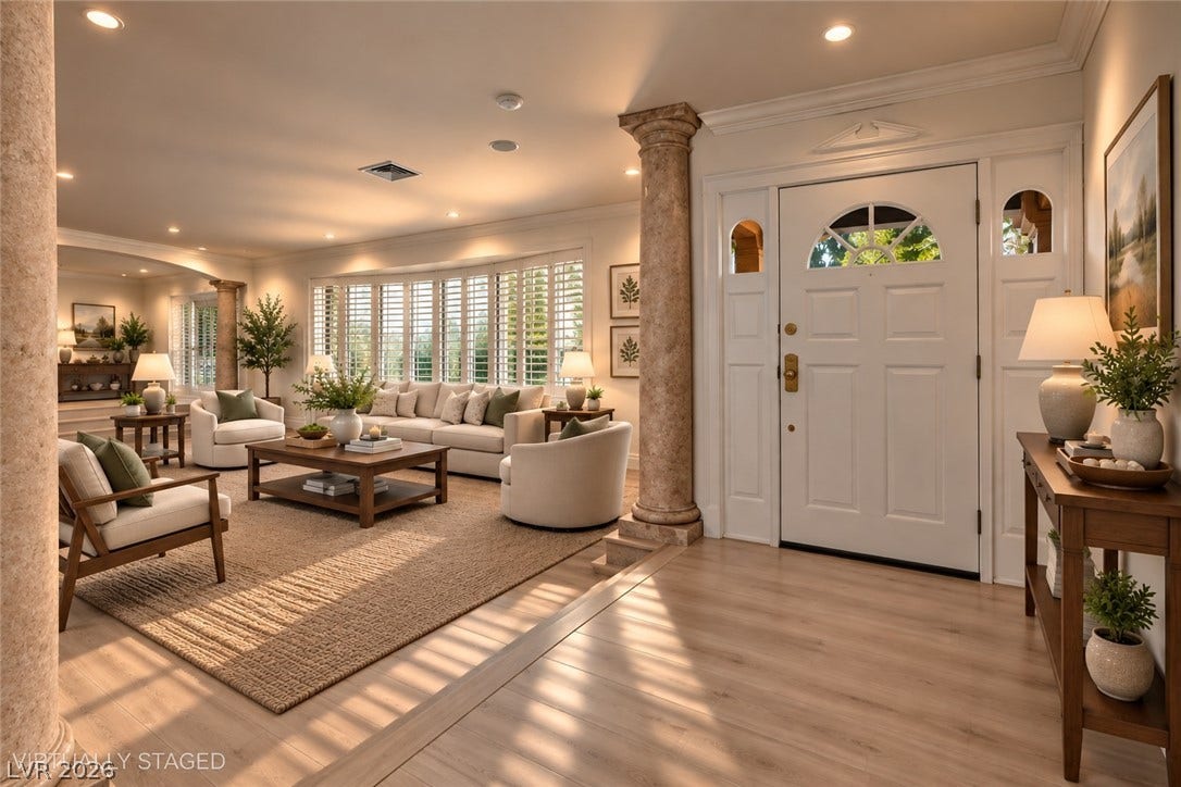 2001 Silver Avenue, Las Vegas, NV 89102 Gleaming wood floors and architectural columns welcome guests into an open-concept living space.