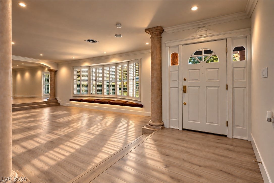 2001 Silver Avenue, Las Vegas, NV 89102 Gleaming wood floors and architectural columns frame a bright entry hall with bay windows.