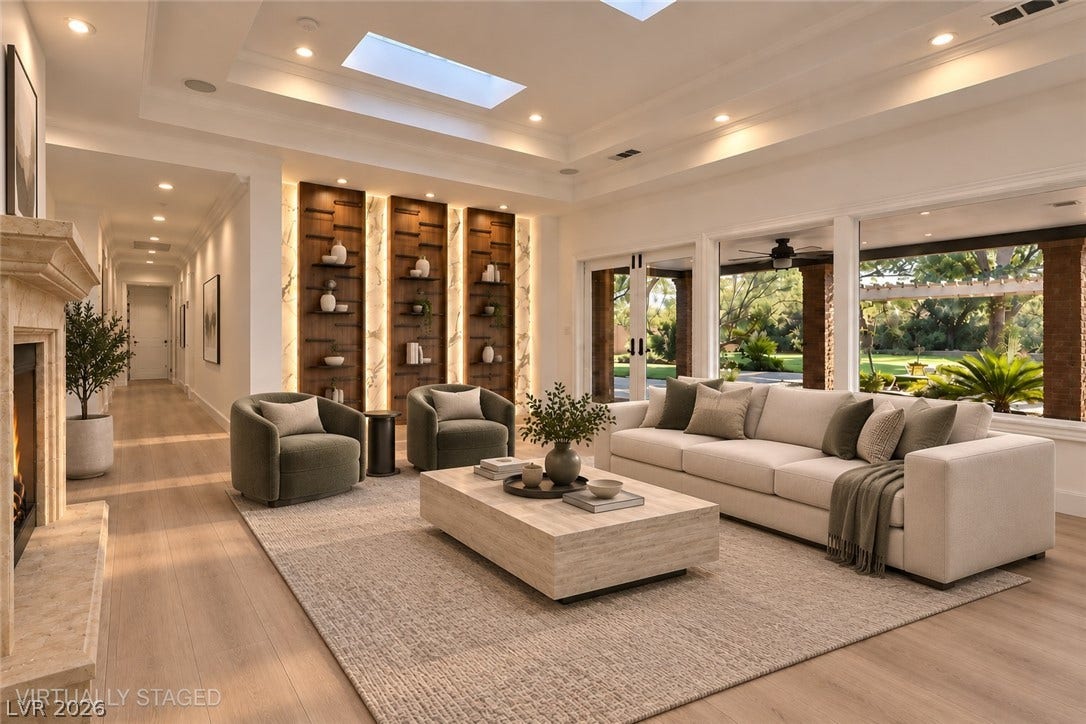 2001 Silver Avenue, Las Vegas, NV 89102 Gleaming hardwood floors and a recessed ceiling with skylights define this elegant living area.