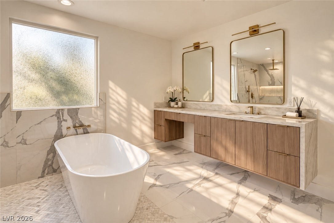2001 Silver Avenue, Las Vegas, NV 89102 A freestanding soaking tub and floating double vanity highlight this elegant space.