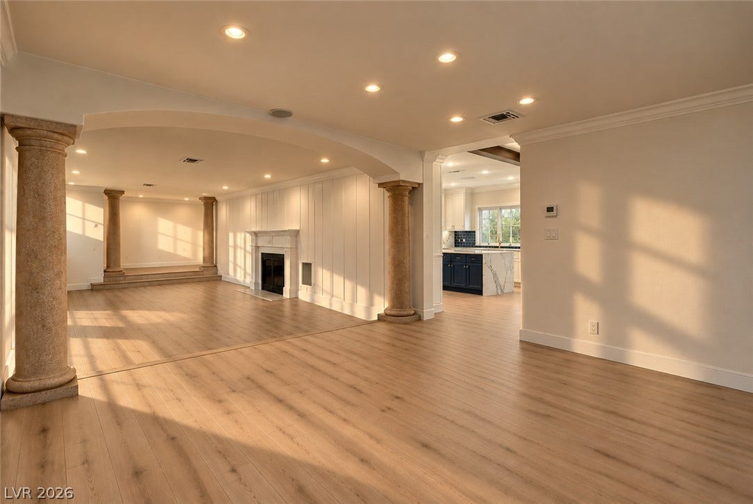 2001 Silver Avenue, Las Vegas, NV 89102 Classical stone columns and warm wood floors define this open architectural living space.
