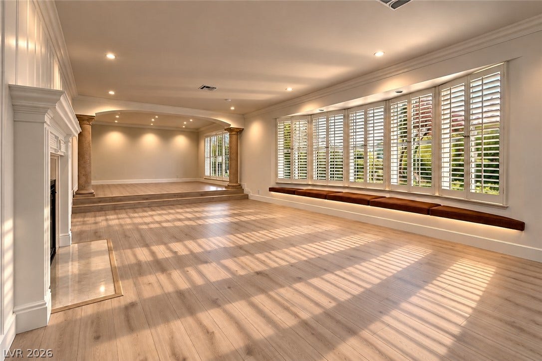 2001 Silver Avenue, Las Vegas, NV 89102 Gleaming wood floors and customized plantation shutters define this grand, multi-level living area.