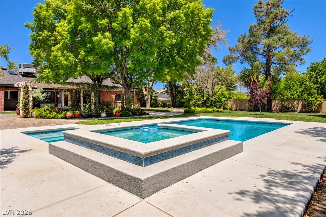 2001 Silver Avenue, Las Vegas, NV 89102 Mature trees shade a spacious concrete patio surrounding the private pool and raised spa.
