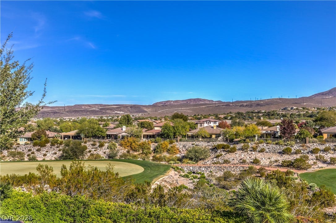 16 Anthem Pointe Court, Henderson, NV 89052 Panoramic mountain and valley vistas stretch across the horizon beyond the manicured golf course greens.