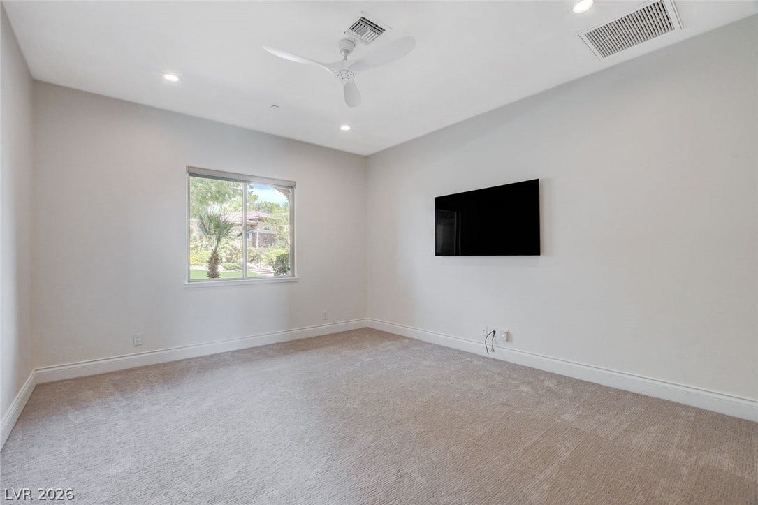 84 Kittansett Loop, Henderson, NV 89052 Plush carpeting and soft recessed lighting create a comfortable, inviting atmosphere.