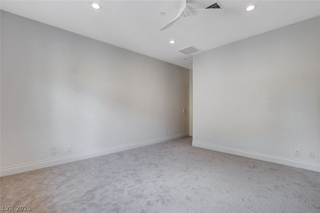 84 Kittansett Loop, Henderson, NV 89052 Smooth neutral walls and plush wall-to-wall carpeting define this versatile interior space.