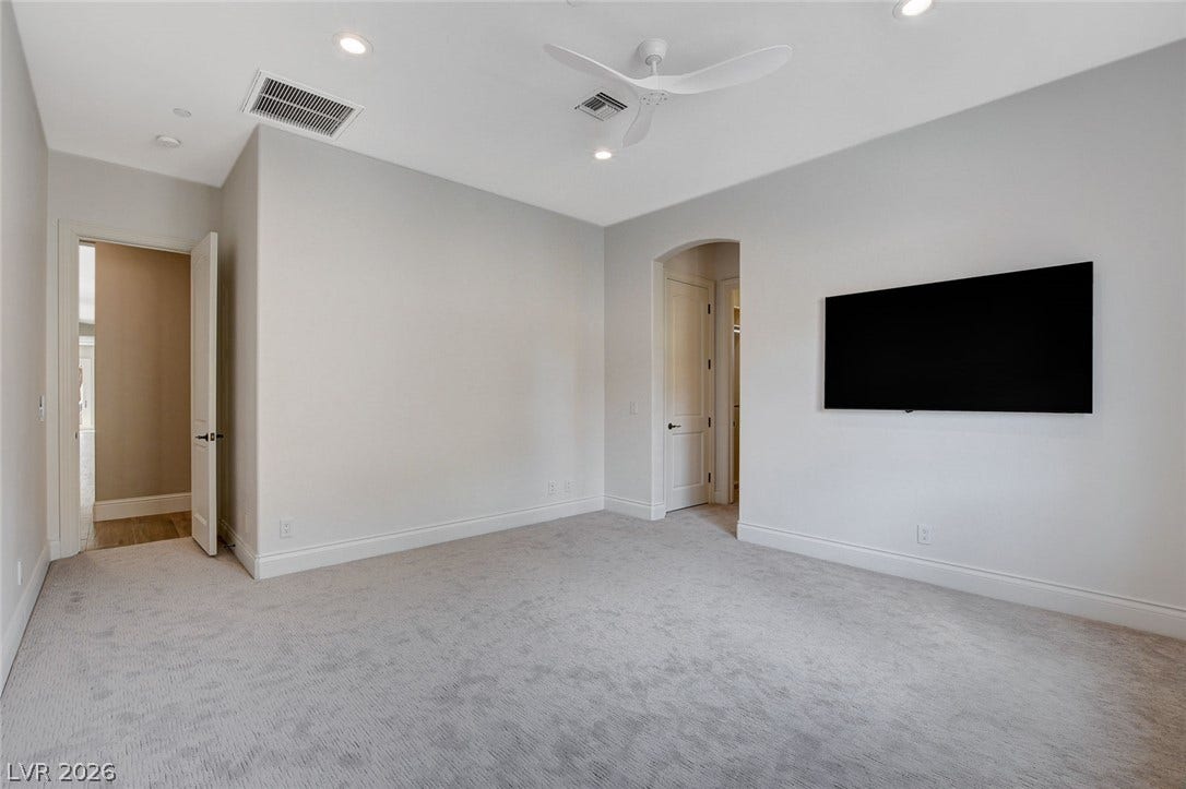 84 Kittansett Loop, Henderson, NV 89052 Plush carpeting and clean lines define this modern bedroom.