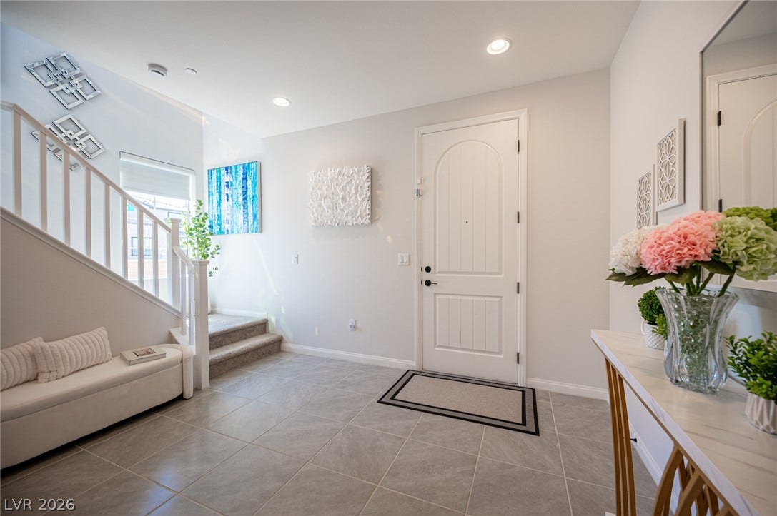 320 Della Pergola Place, Henderson, NV 89015 An inviting entrance foyer welcomes guests with durable tile flooring and recessed lighting.