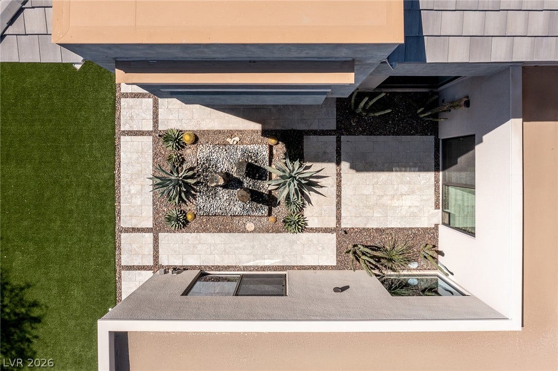 Aerial View of Private Central Courtyard with Tranquil Water Feature