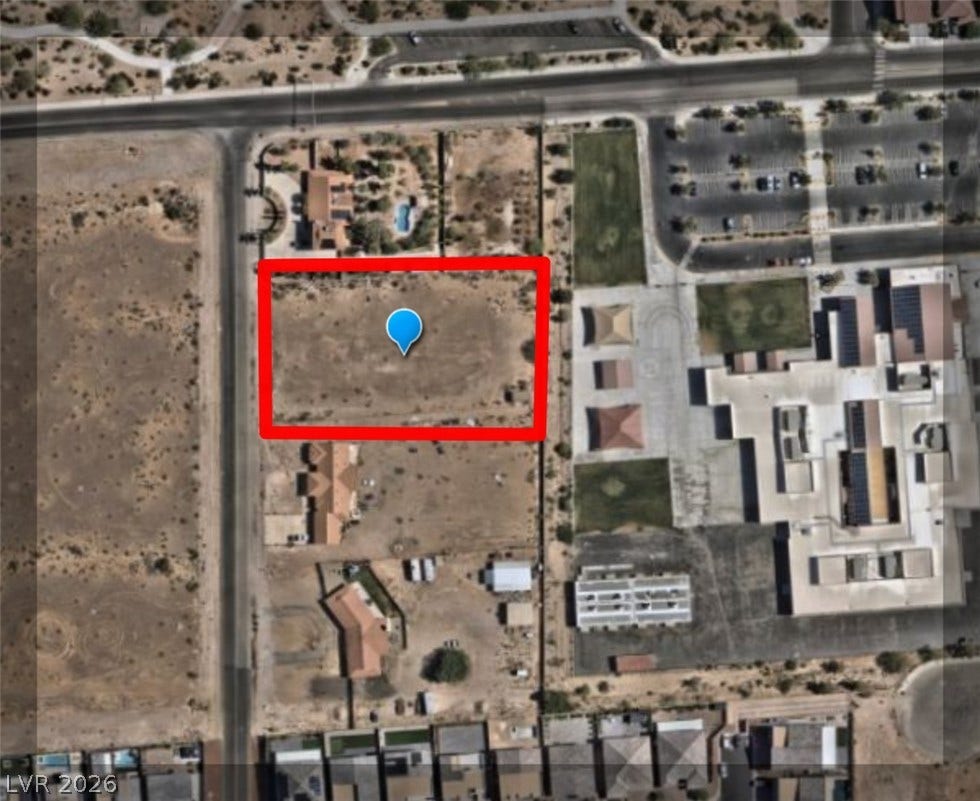 Redwood Street, Las Vegas, NV 89139 An aerial overhead perspective highlights the designated property lot lines within the neighborhood.