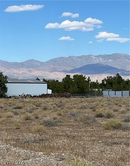 801 S Ford Loop, Pahrump, NV 89048 Sweeping mountain vistas frame the open landscape beyond the property boundary.