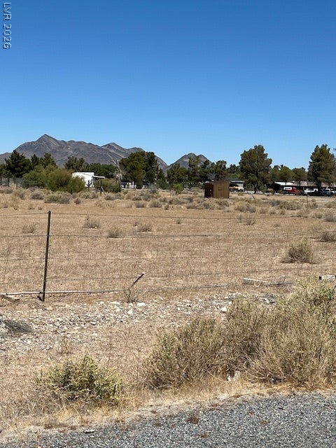 801 S Ford Loop, Pahrump, NV 89048 Rugged desert topography offers a natural canvas framed by distant mountain peaks.
