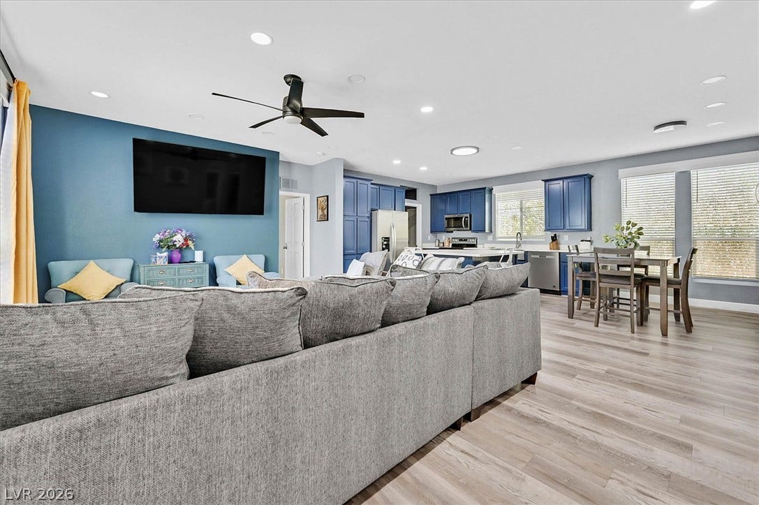 An open-concept living area with integrated kitchen and dining, ideal for entertaining.