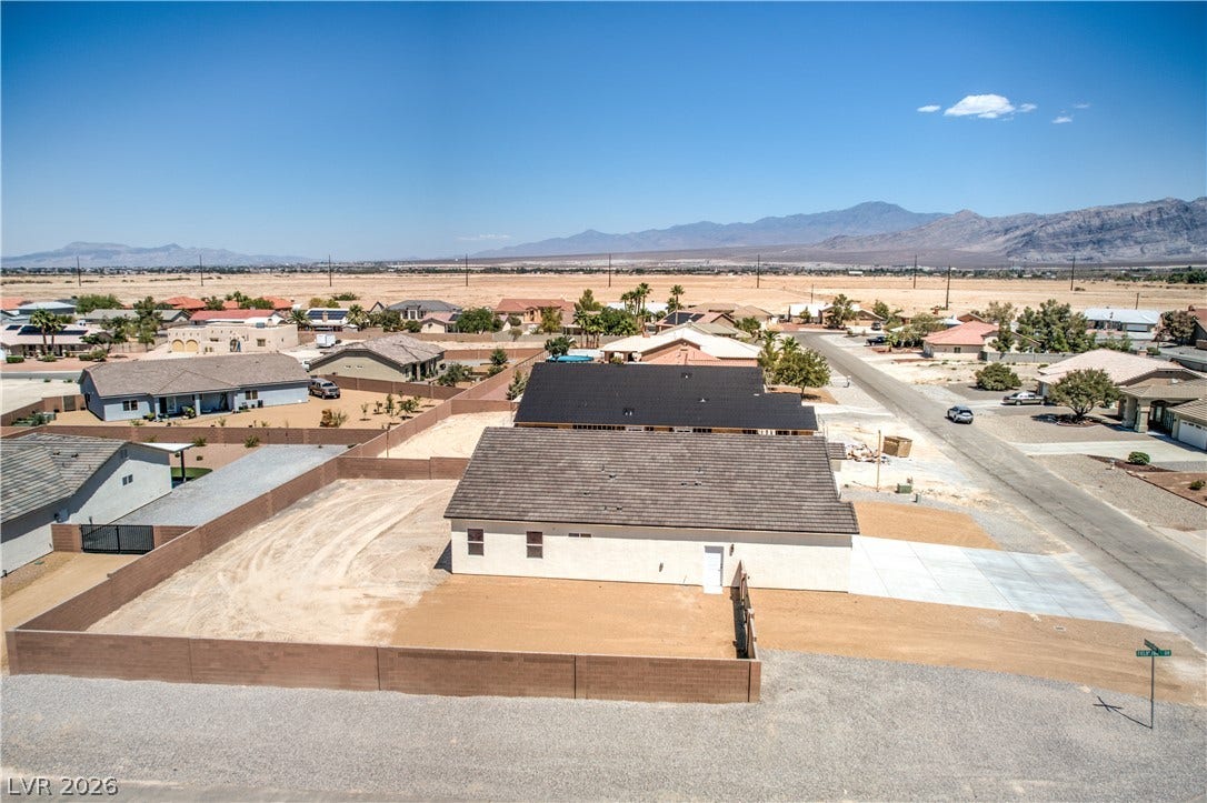 Aerial view of residential area with mountains