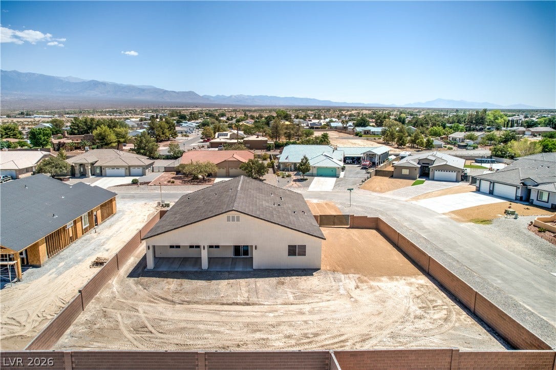 Aerial perspective of suburban area featuring mountains