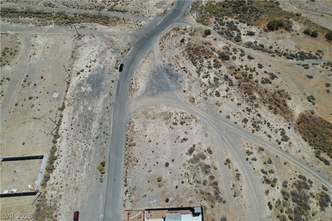 1060 S Firebird Circle, Pahrump, NV 89048 Paved roads wind through a sprawling desert landscape ready for development.