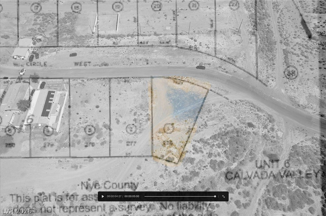 1060 S Firebird Circle, Pahrump, NV 89048 An aerial overlay outlines the boundaries of this vacant desert lot.