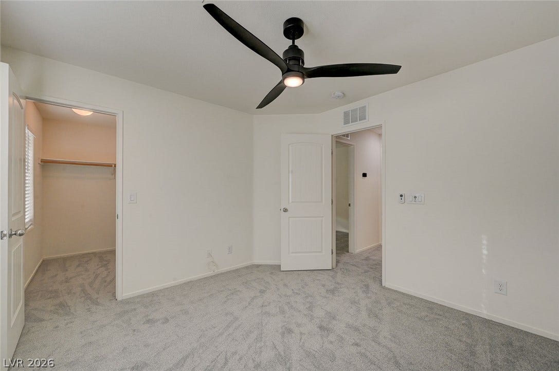 5608 Beckett Hill Court, Las Vegas, NV 89135 Plush carpeting and a walk-in closet highlight this private retreat.