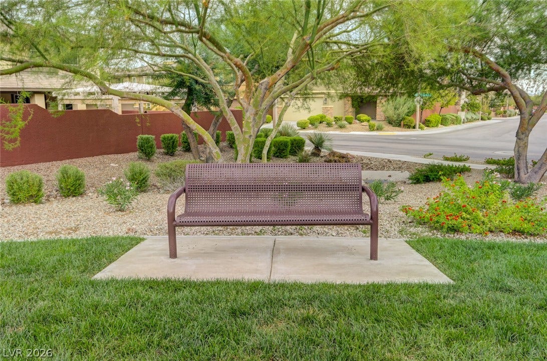 5608 Beckett Hill Court, Las Vegas, NV 89135 Mature trees shade a peaceful sitting area nestled along the manicured neighborhood street.