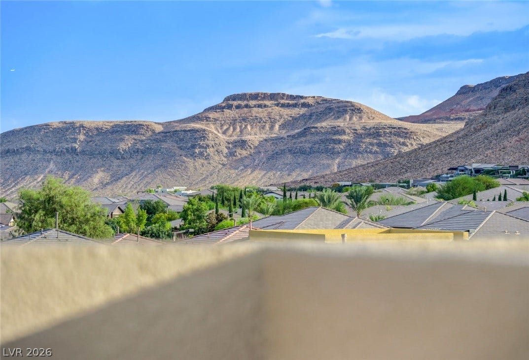 5608 Beckett Hill Court, Las Vegas, NV 89135 Sweeping mountain vistas overlook the surrounding neighborhood rooftops.