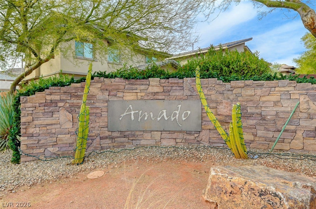 5608 Beckett Hill Court, Las Vegas, NV 89135 Welcoming stone monument sign introduces this beautifully landscaped desert community.