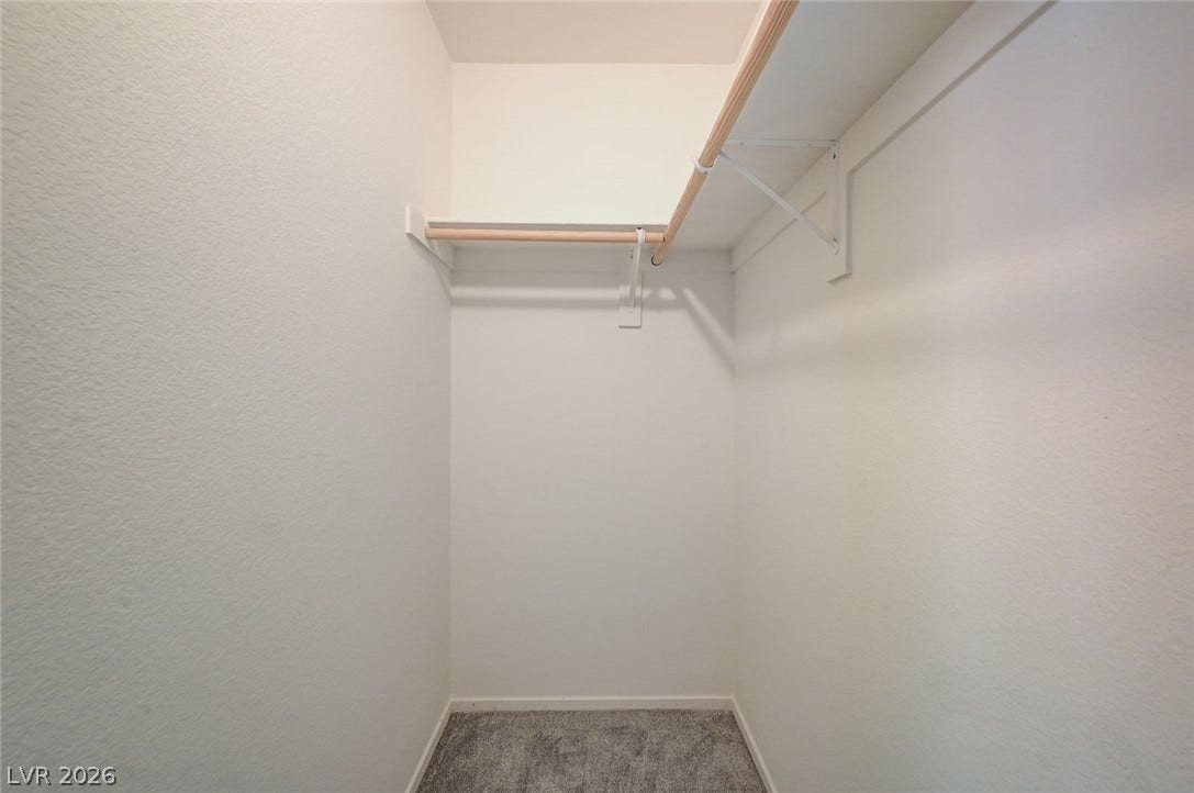 5608 Beckett Hill Court, Las Vegas, NV 89135 Functional storage space features integrated shelving and plush carpeting.