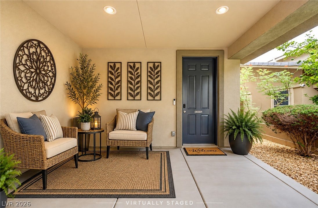 5608 Beckett Hill Court, Las Vegas, NV 89135 An inviting covered entryway welcomes guests with clean concrete flooring and recessed lighting.