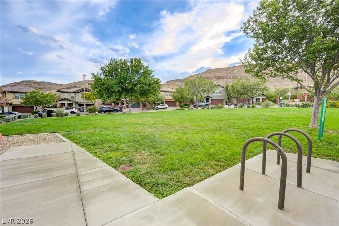 5608 Beckett Hill Court, Las Vegas, NV 89135 A spacious neighborhood park with manicured lawns sits set against scenic mountain backdrops.