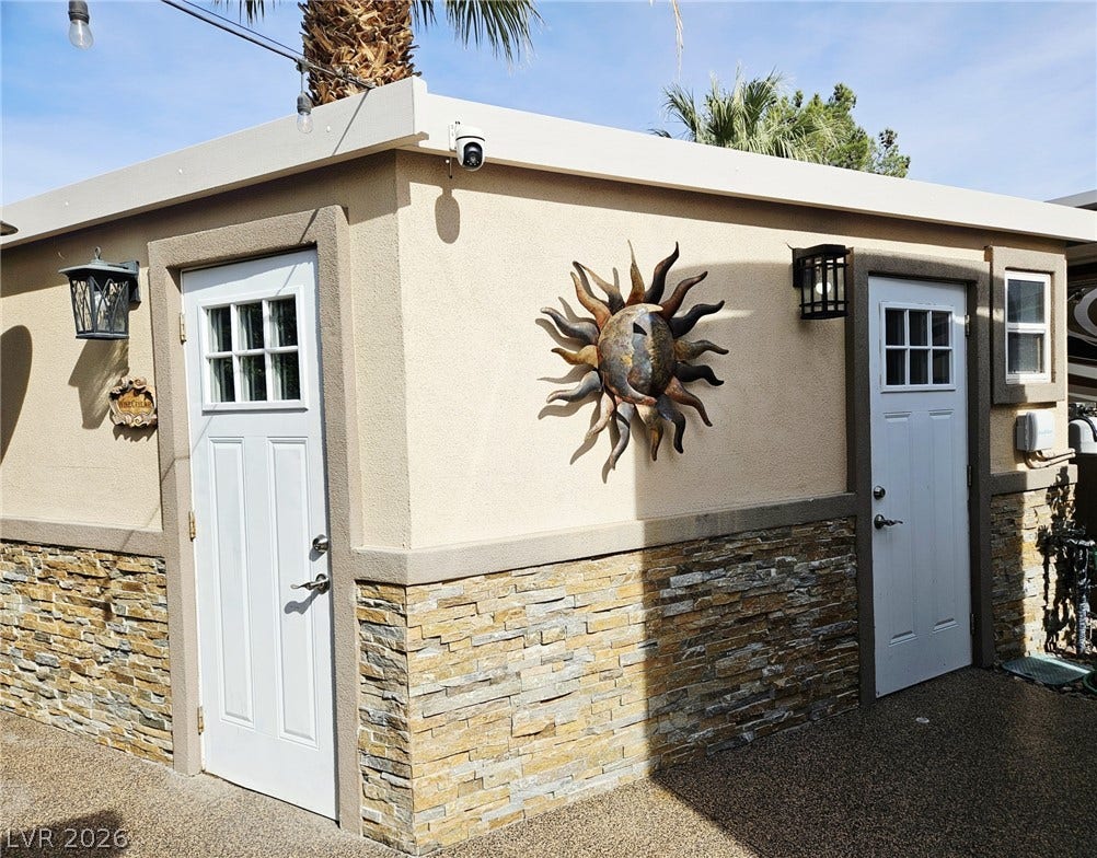 8175 Arville Street, #287, Las Vegas, NV 89139 Stucco and stone veneer exterior detailing accents this versatile outdoor storage structure.