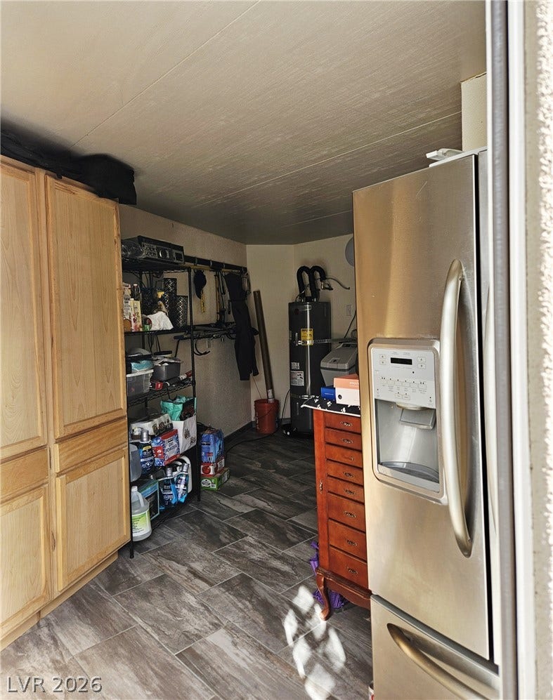 8175 Arville Street, #287, Las Vegas, NV 89139 Functional utility space features durable tile flooring, ample cabinetry, and modern appliances.