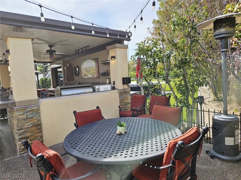 8175 Arville Street, #287, Las Vegas, NV 89139 An inviting outdoor kitchen and covered patio overlook the manicured yard.