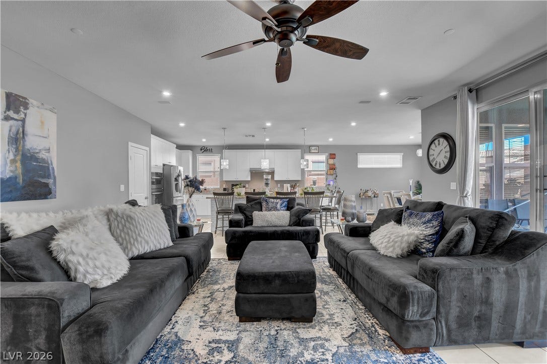 6834 Moorland Street, North Las Vegas, NV 89084 An open floorplan seamlessly connects the living space with the adjacent kitchen.