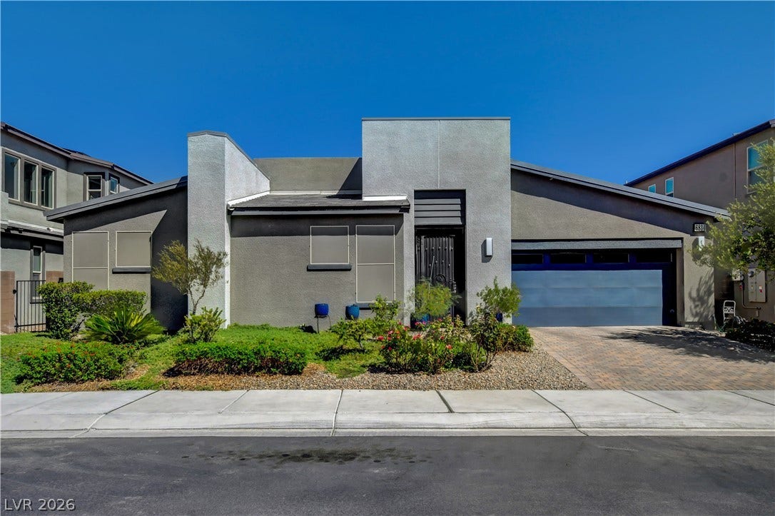 6834 Moorland Street, North Las Vegas, NV 89084 Clean lines and modern geometric architecture define this single-story home with integrated garage.
