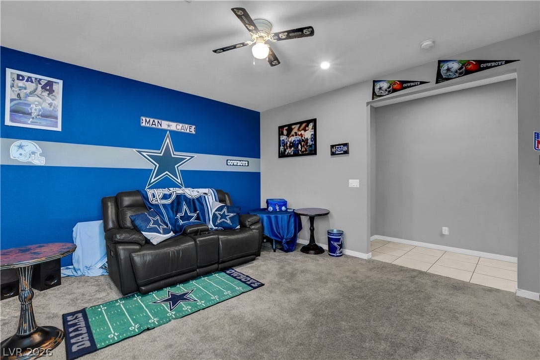 6834 Moorland Street, North Las Vegas, NV 89084 Smooth plaster walls and recessed lighting define this versatile recreation space.