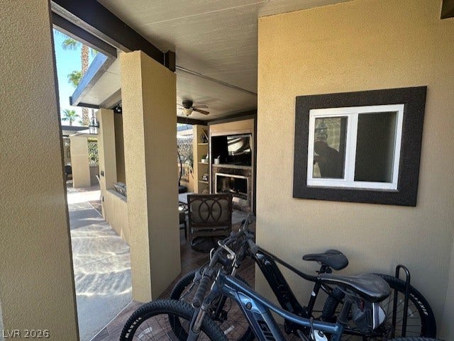 8175 Arville Street, #133, Las Vegas, NV 89139 A sheltered breezeway connects the main structure to an inviting outdoor living pavilion.