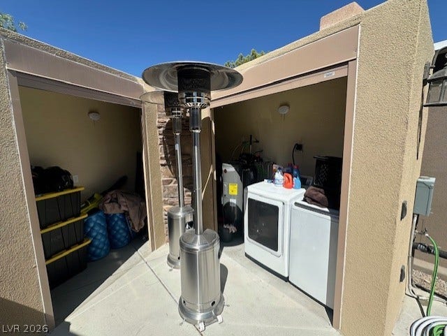 8175 Arville Street, #133, Las Vegas, NV 89139 A dedicated outdoor alcove houses a washer and dryer setup alongside handy utility storage.
