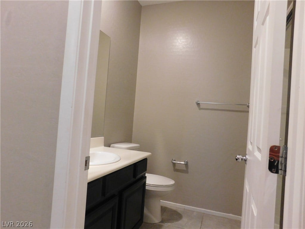 2715 Amazing Meadows Avenue, #1185, North Las Vegas, NV 89031 Clean lines and a functional layout define this convenient half bath.