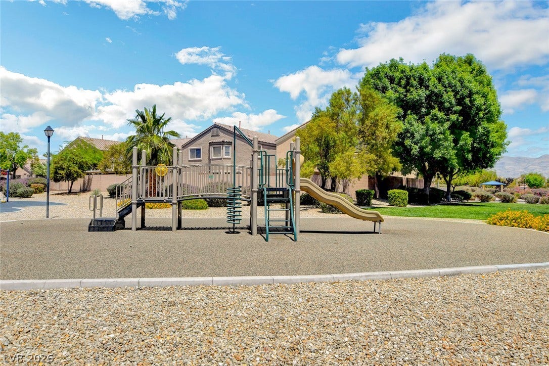 5508 Meridian Rain Street, North Las Vegas, NV 89031 A well-maintained neighborhood playground is set within a beautifully landscaped park area.