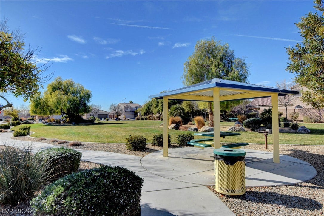 5508 Meridian Rain Street, North Las Vegas, NV 89031 Paved walking paths wind through a beautifully landscaped neighborhood park with a covered picnic pavilion.